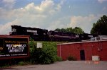 NS 5254 leads a U23B and SD60 southbound with a train approaching Wade Avenue